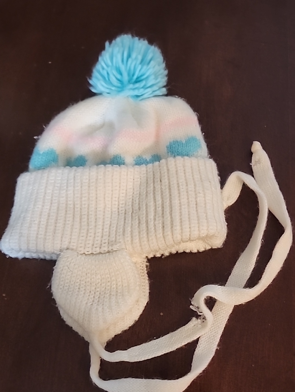 Children's White Knit Pom Pom Earflap Hat with Blue Accents